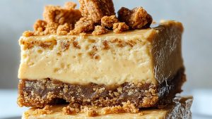 Cookie-Butter-Cheesecake-Bars-Delish