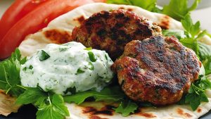 Lamb patties with pita bread and tzatziki